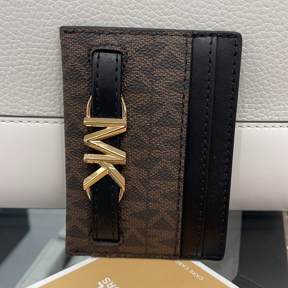 MICHAEL KORS
Reed Large Card Holder Case Wallet 
Brown /Black MK Signature 
NWT - Picture 9 of 16